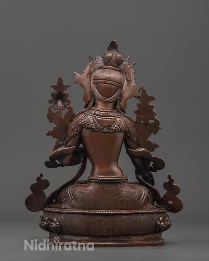 Back view of oxidized copper White Tara Long Life Deity statue handcrafted by Patan artisan