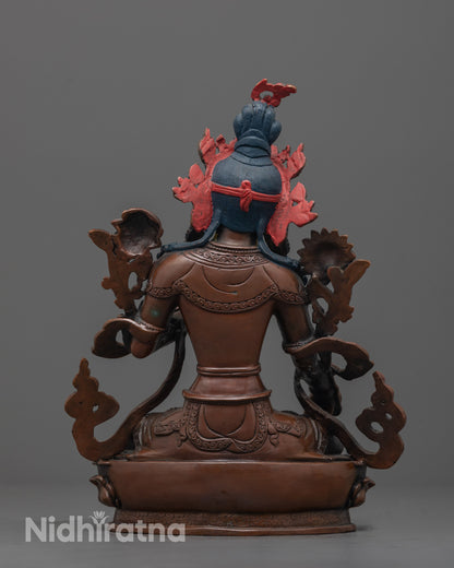 Back view of oxidized copper White Tara Statue with detailed lotus seat and flowing robe
