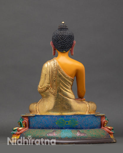 Back view of sacred Shakyamuni Buddha figurine on multi-colored lotus throne, handcrafted Nepalese spiritual décor