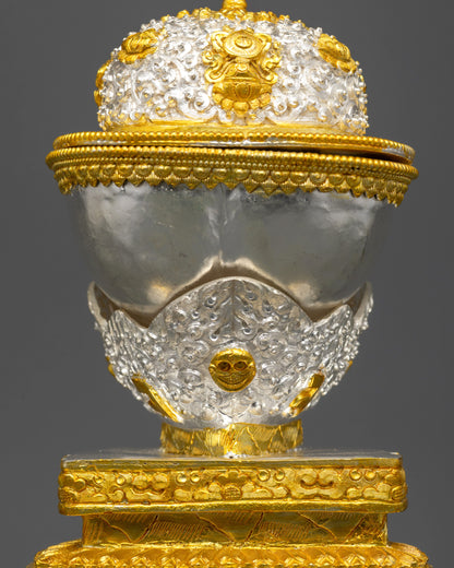 Back view of silver and gold Kapala featuring intricate filigree patterns and carvings