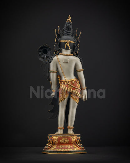 Back view of standing Padmapani showing intricate hand-carved motifs on lower garment