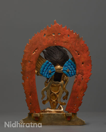 Back view of the Dorje Phurba Statue revealing elaborate robe patterns and copper texture