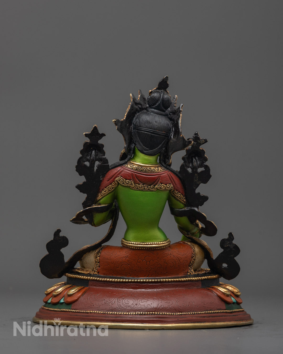 Back view of the Green Tara Statue showcasing the intricate robe carvings