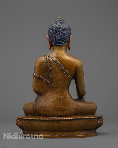 Shakyamuni Buddha sculpture showing intricate details and hollow chamber for mantra placement.