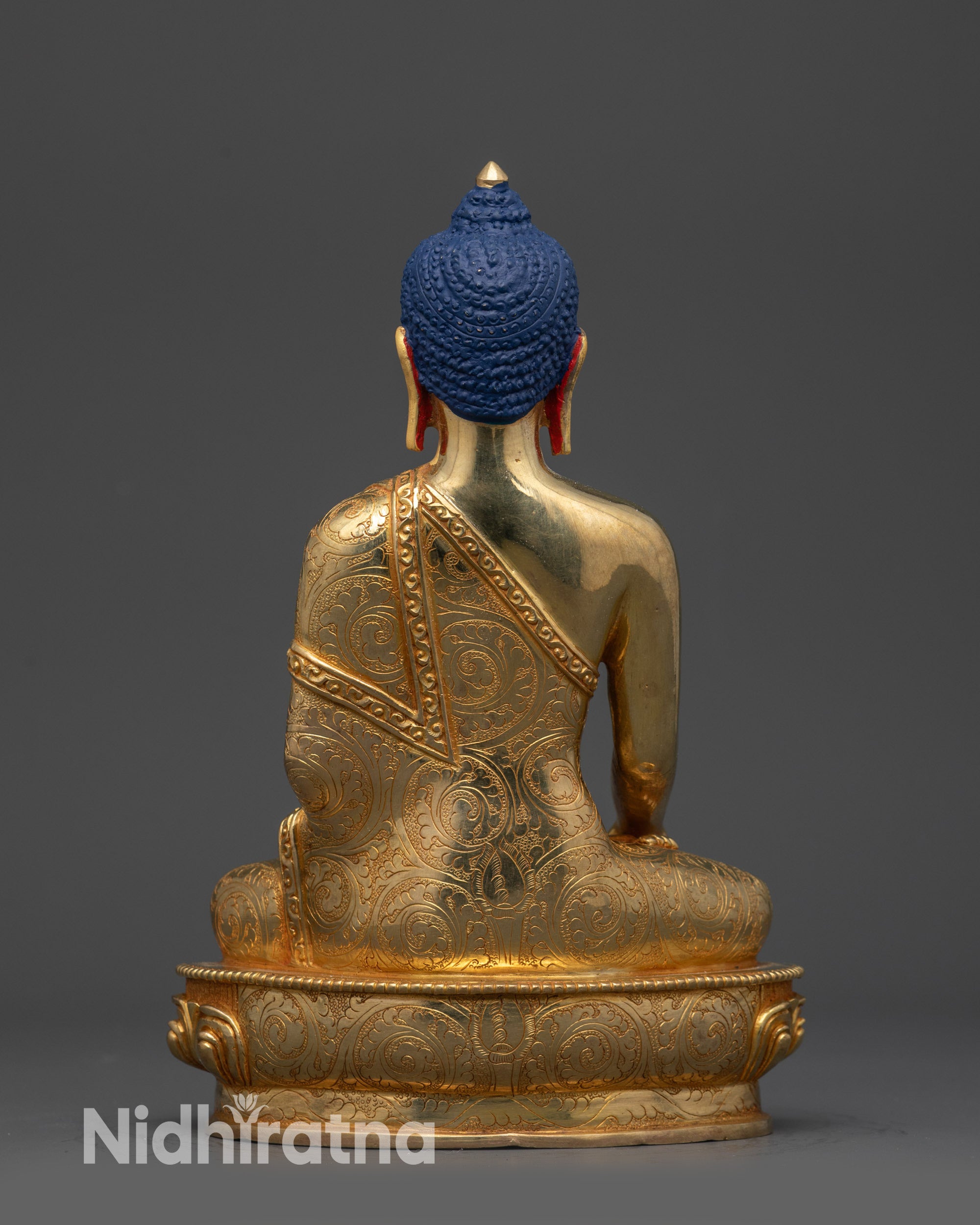 Back view of the Shakyamuni statue showing detailed artisan craftsmanship.