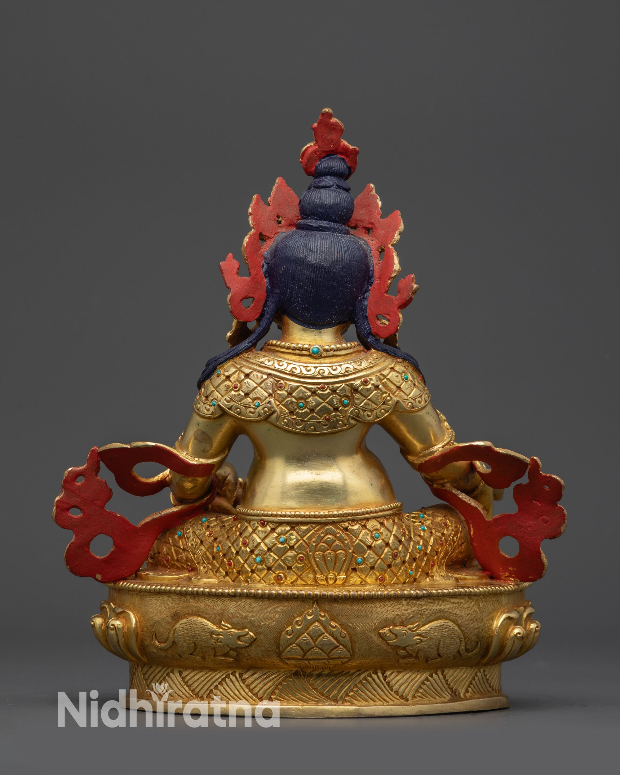 Back view of the handcrafted Dzambhala statue showing detailed artisan work.