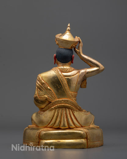 Back view of the sleeping Karmapa Buddha Statue highlighting oxidized copper