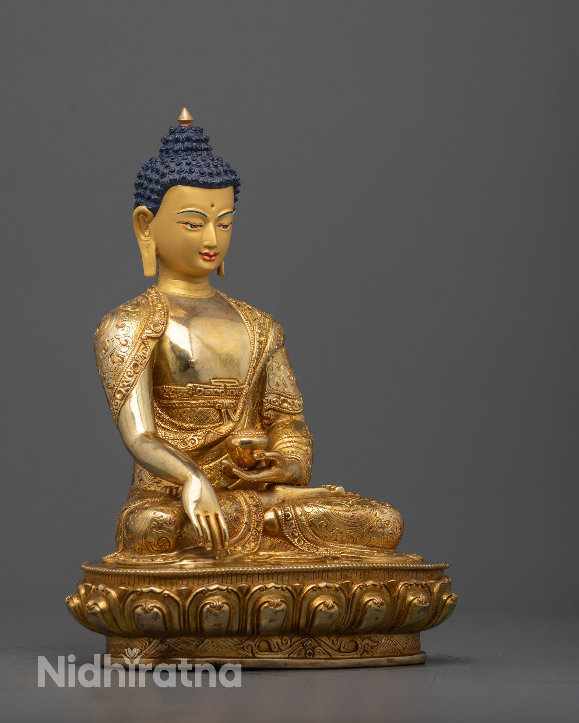 Back view of traditional Nepalese Buddha statue highlighting halo and carvings
