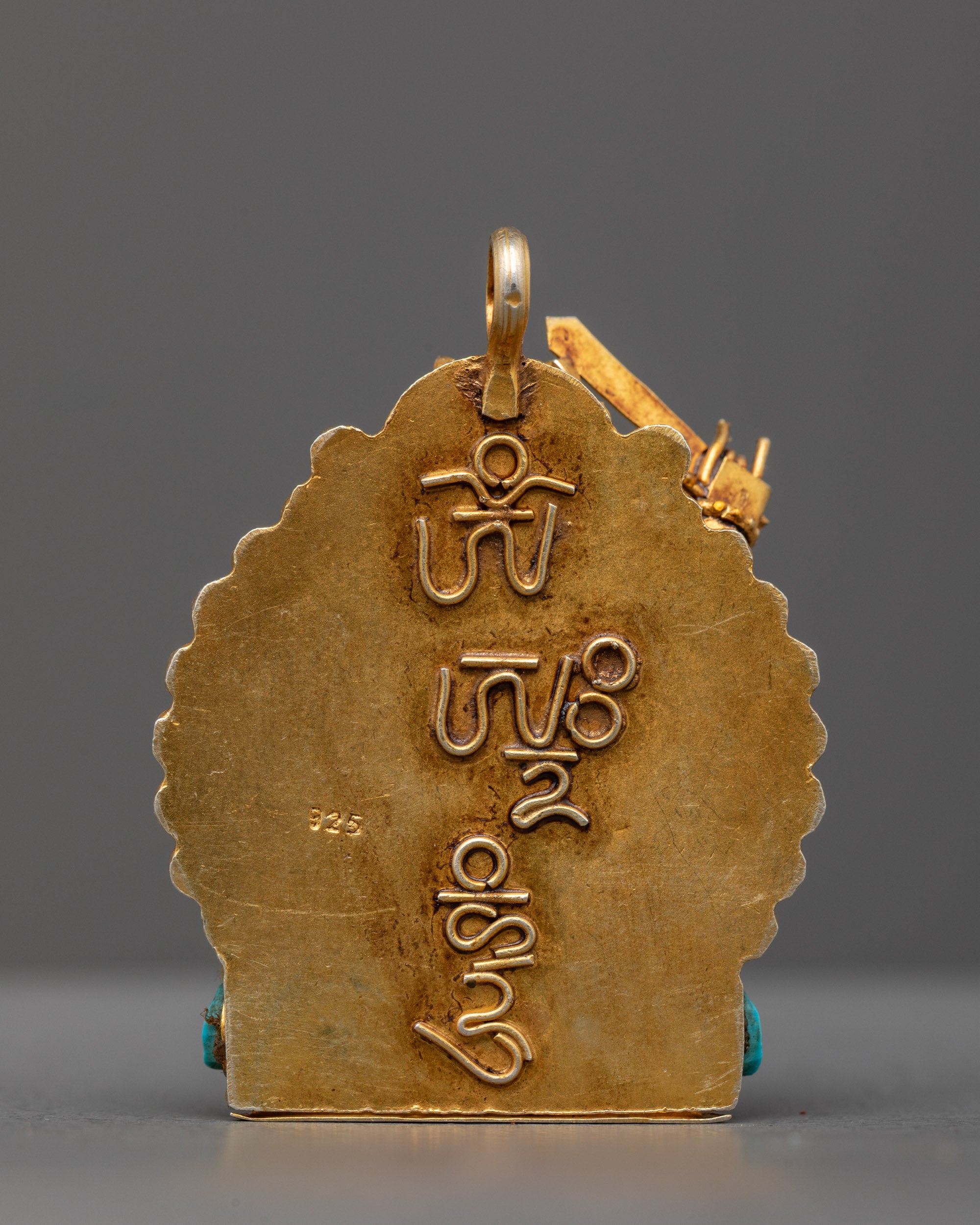 Back view of traditional Nepalese Coral Manjushri Locket, symbolizing wisdom and spiritual clarity