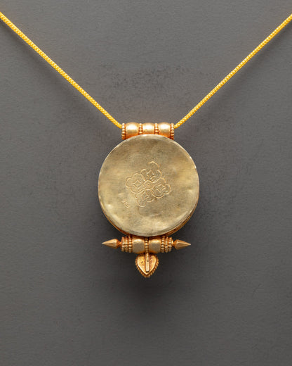 Back view of traditional Tibetan locket handcrafted in Patan with ornate sacred patterns