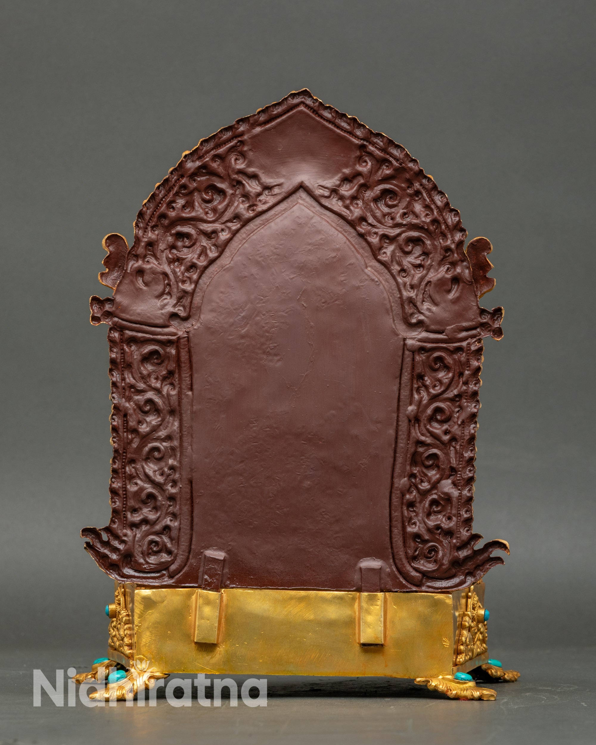 Back view ornate throne floral motifs mythical creatures Newari craftsmanship