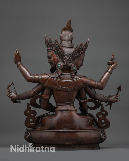 Back view oxidized Namgyalma statue with detailed robes and traditional copper work