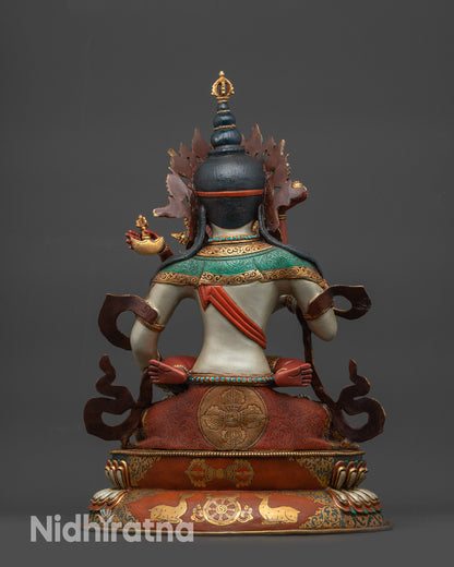 Back view showing intricate lotus seat carvings with dharma wheel and deer