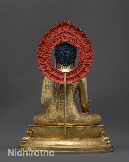Back view showing lotus seat, dharma wheel, and detailed Vajra carvings
