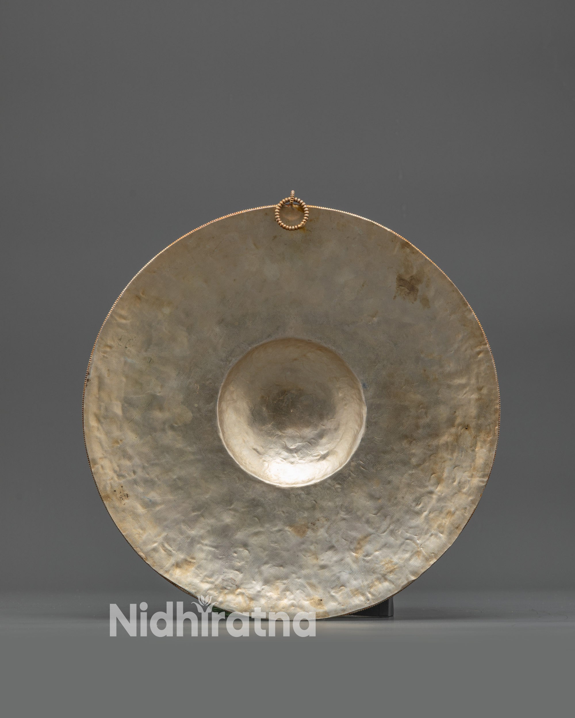 Back view swirling cloud motif on Tibetan mandala evoking divine energy and mindfulness