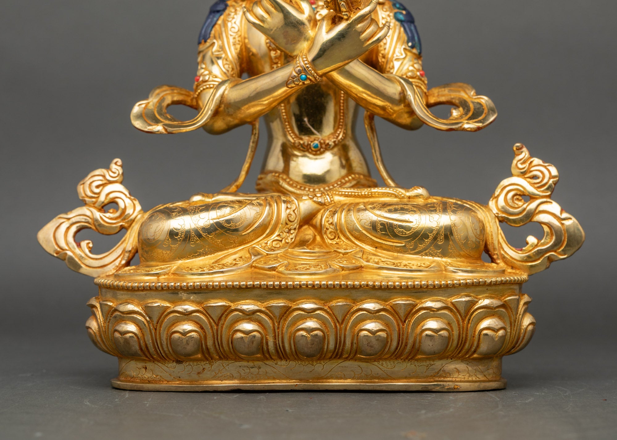 Base view Vajradhara statue with engraved lotus disc and Newari artisan design