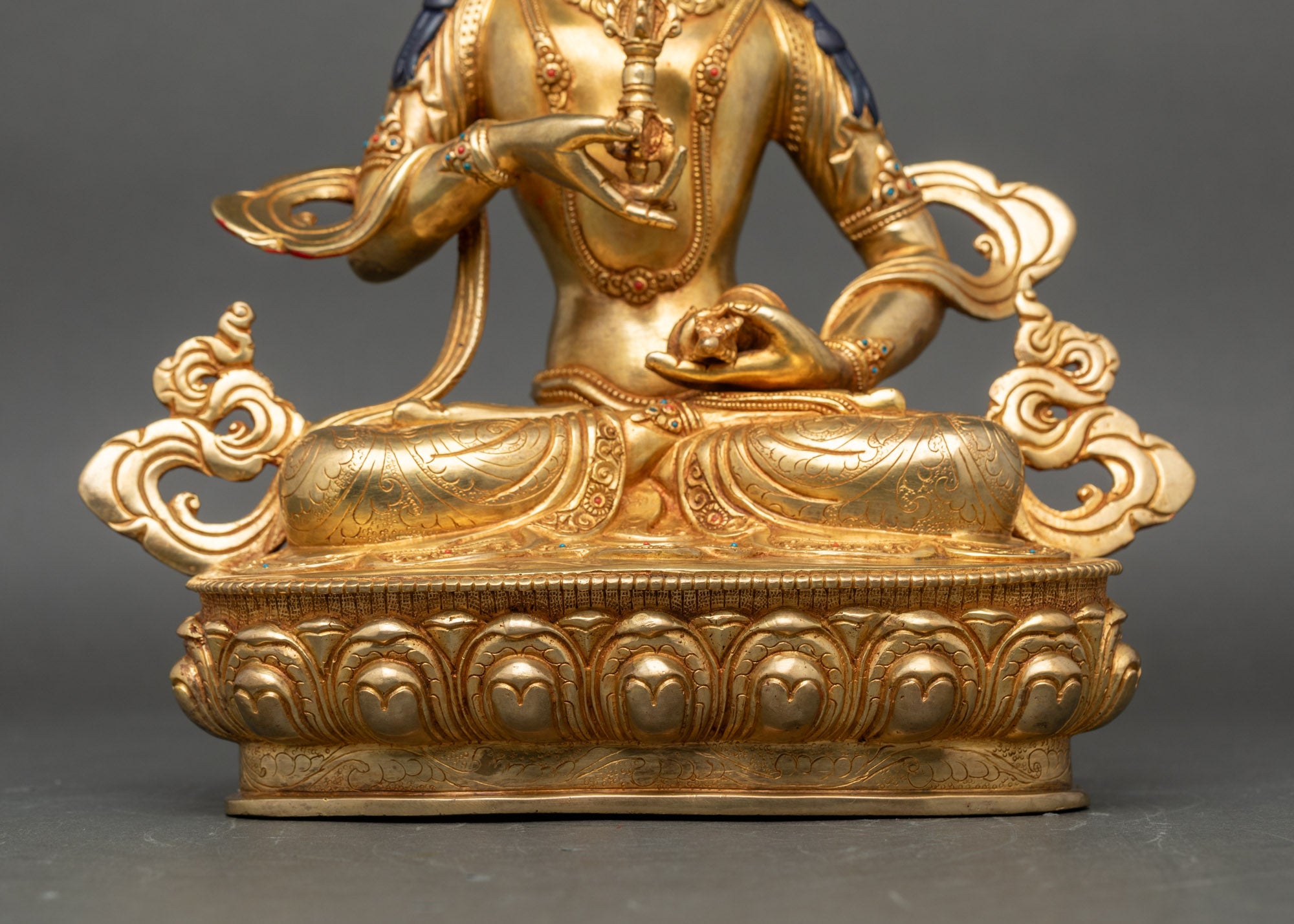 Base view Vajrasattva statue with engraved lotus disc and traditional Newari design