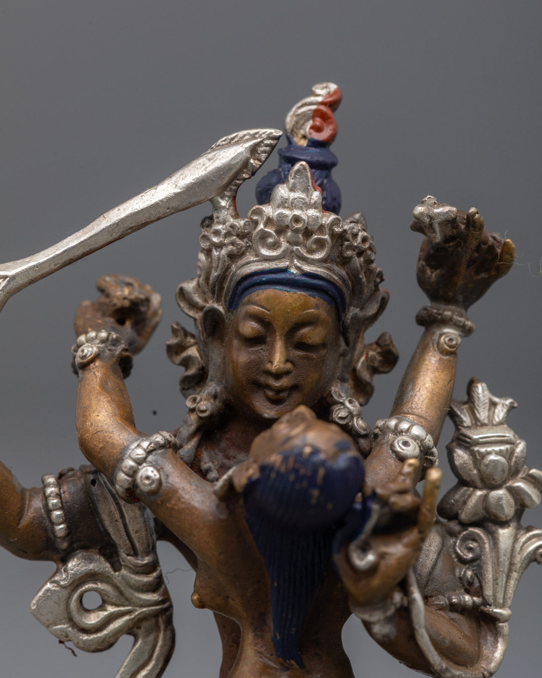 Beautifully painted Manjushri Statue featuring intricate acrylic details and silver-plated crown