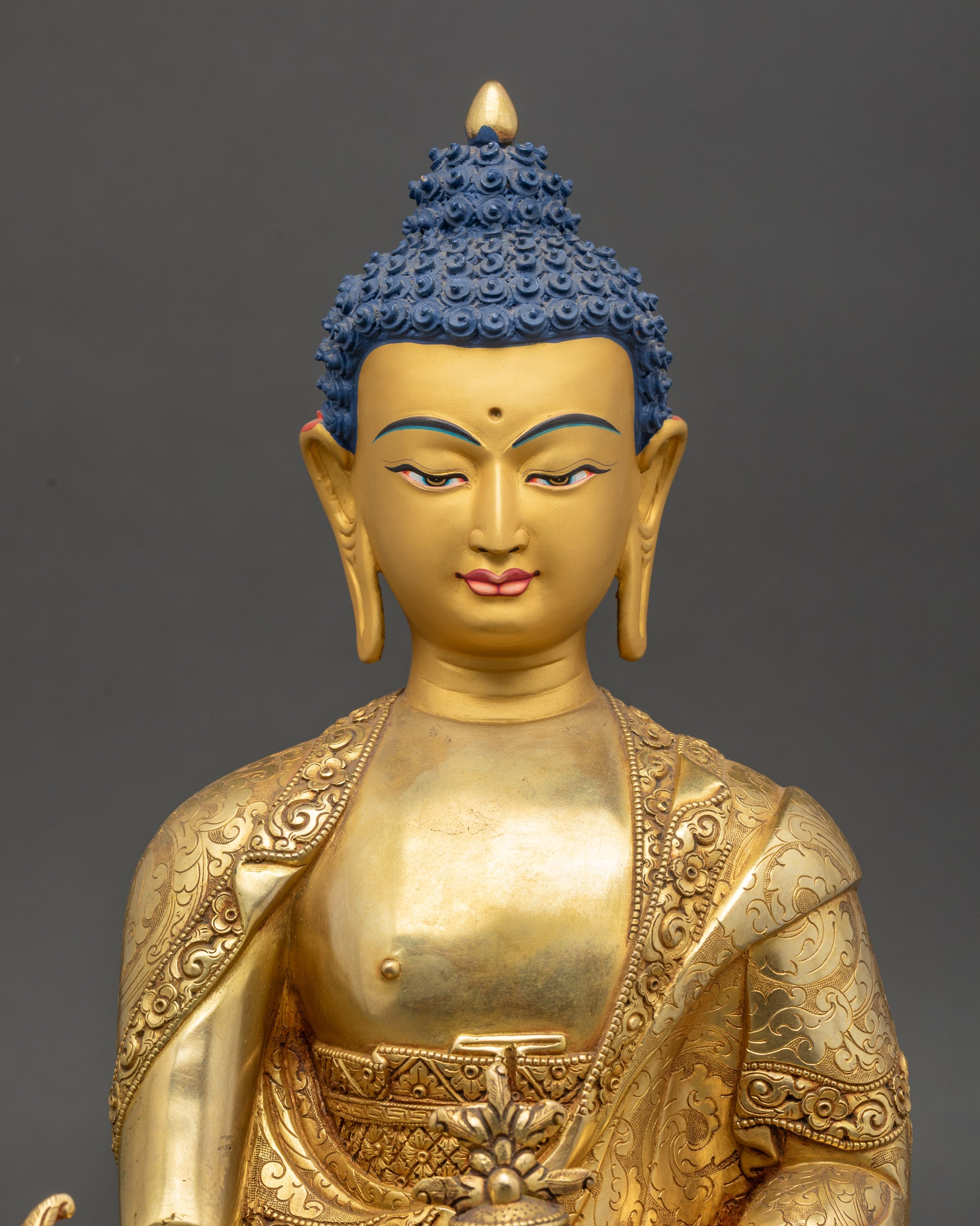 Bhaisajyaguru gold-painted face 3D carvings detailed close up