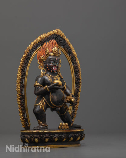 Side view of Premium copper Black Dzambhala statue featuring traditional lost wax craftsmanship