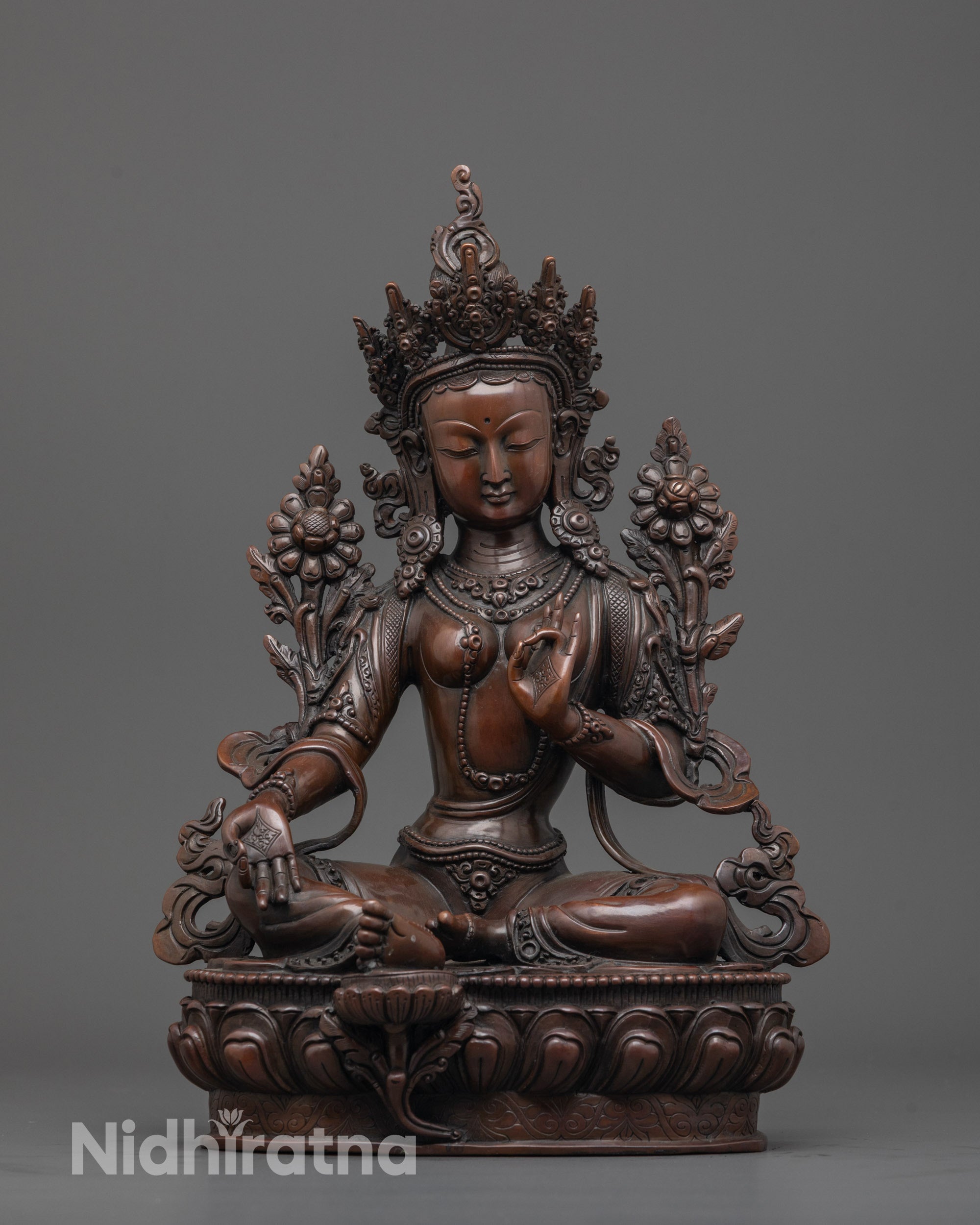 Bring sacred presence with our Oxidized Green Tara statue front view showing intricate details.