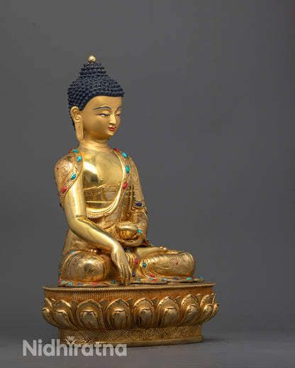 Side profile of Shakyamuni Buddha Statue showcasing intricate details of robes