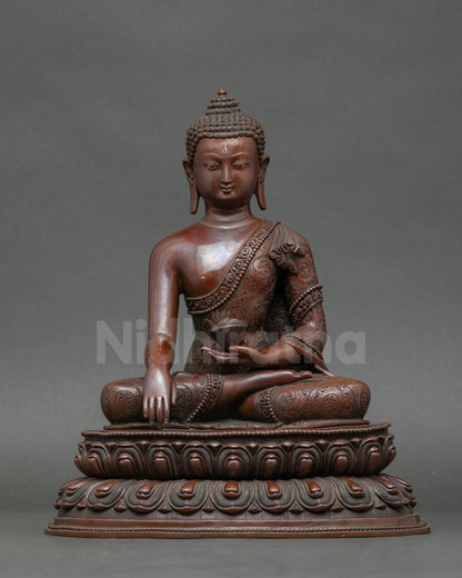 Buddha Shakyamuni statue handcrafted in Patan Nepal, holding monk’s begging bowl