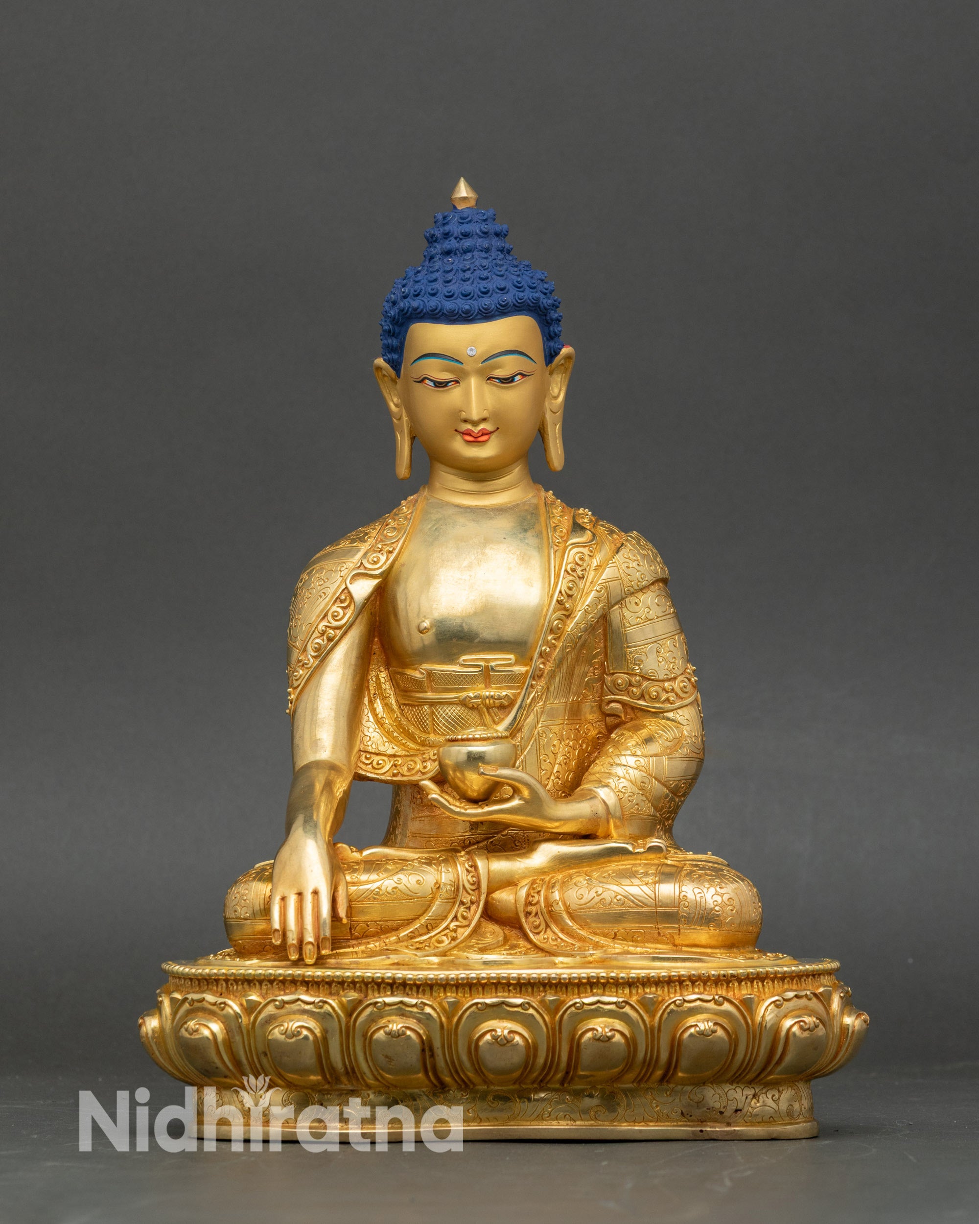 Buddha statue seated on lotus throne, handcrafted Nepalese copper with 24K gilding