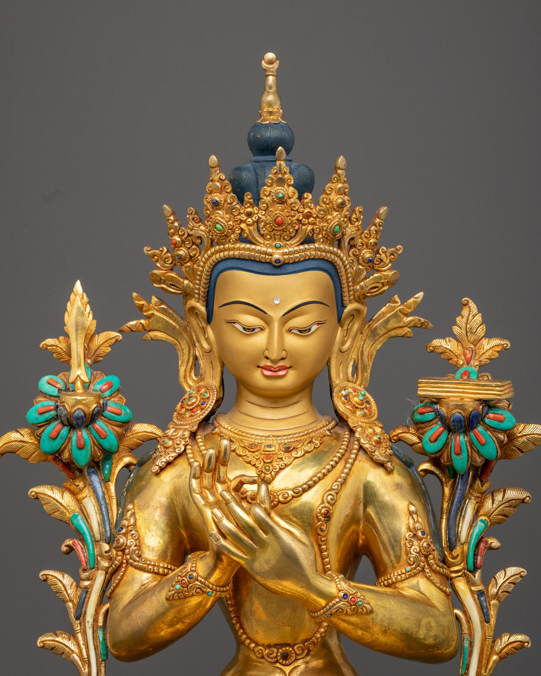 Buddhist Wisdom Deity sculpture adorned with semi-precious stones and rich acrylic paints on Dharmachakra robe