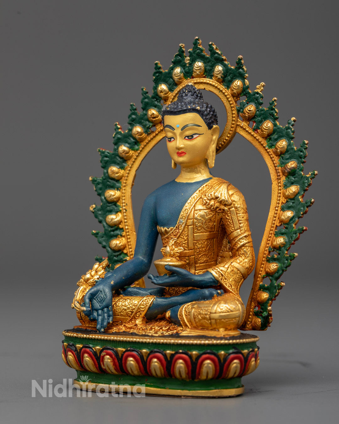 Buddhist healing sculpture with green halo seated on lotus throne with hollow base for mantra and concentration item placement