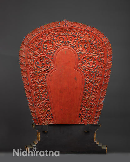 Buddhist lion throne back view showing carved copper structure and gold finish