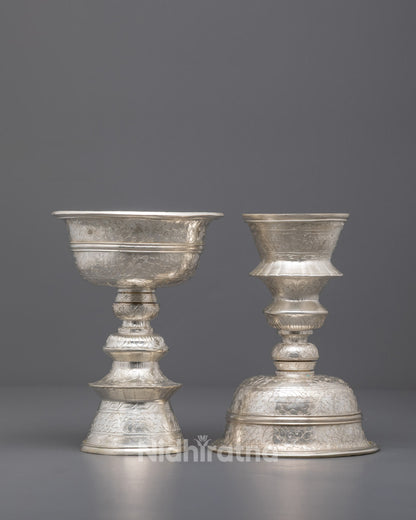 Front view of Buddhist Offering Lamp with Rolled Cotton Wick and Silver Finish