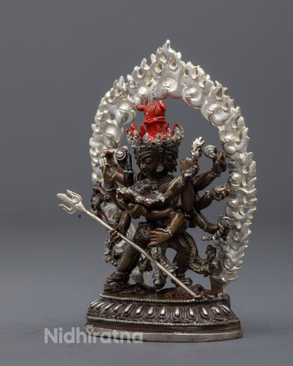 Chakrasamvara 12 armed Yidam deity statue crafted using electroplating with silver plated details and symbolic lotus base
