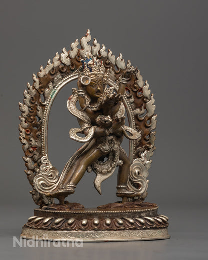Chakrasamvara statue displayed on Buddhist altar symbolizing tantric wisdom, compassion, and spiritual transformation