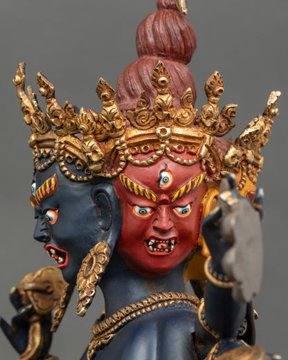 Chakrasamvara statue face with four wrathful expressions and gold details