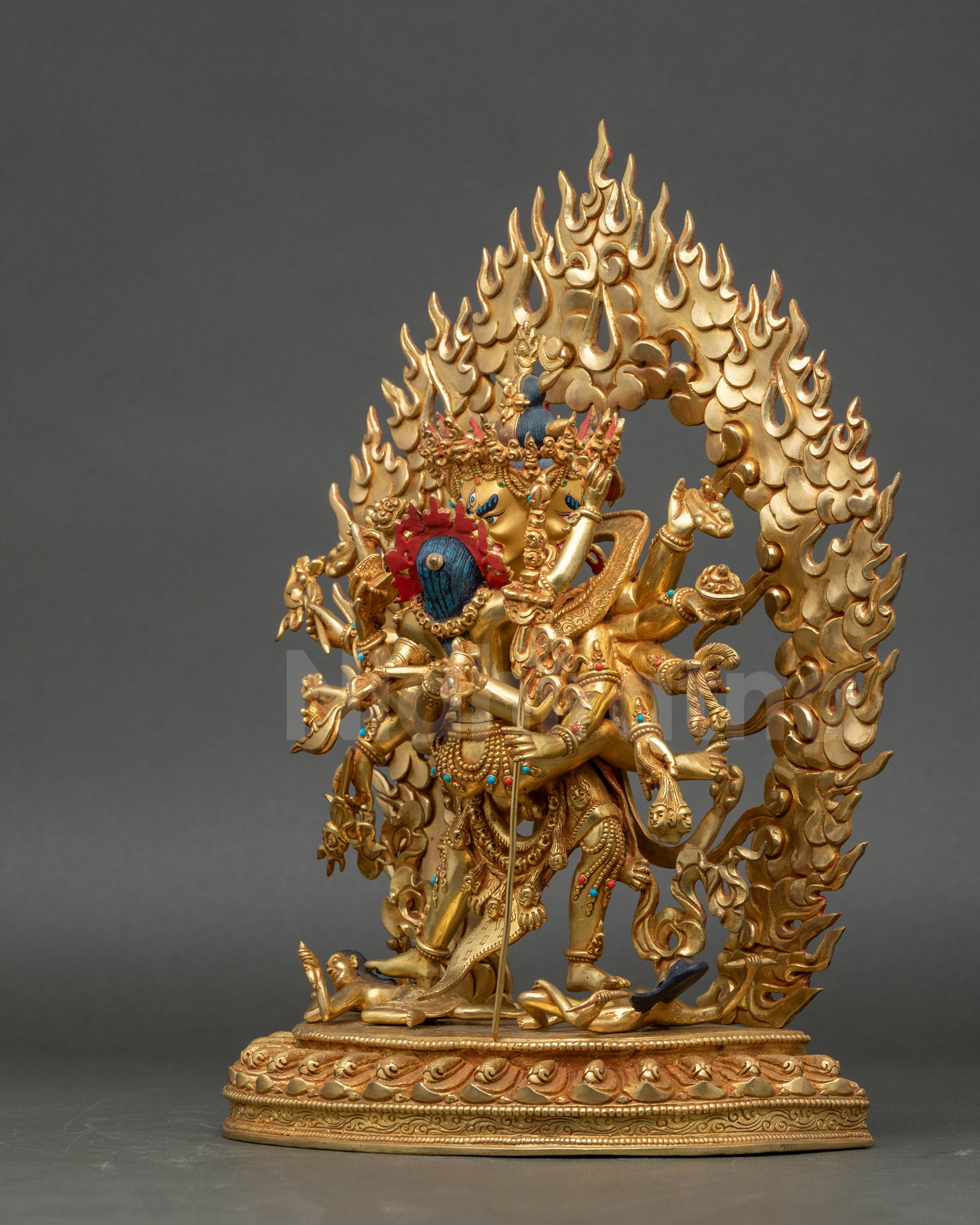 Chakrasamvara statue left side view highlighting lotus seat and deity attributes
