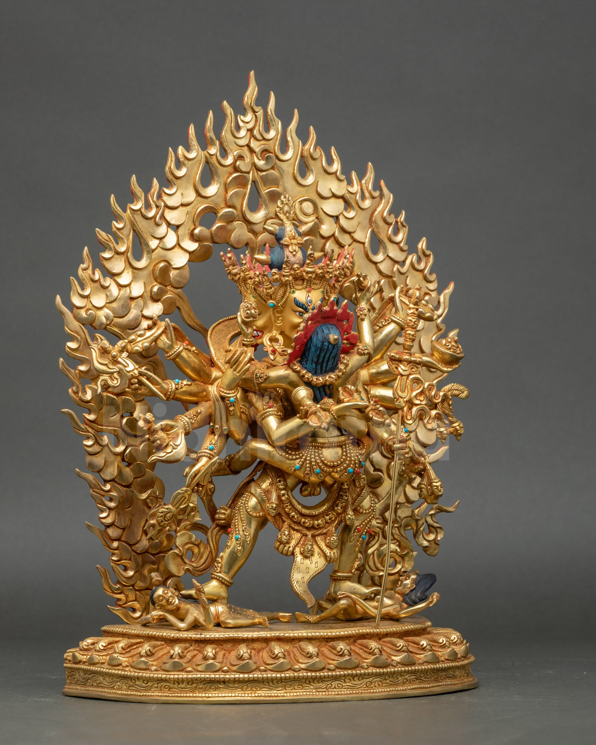 Chakrasamvara statue right side view with gold-fire gilded features and halo