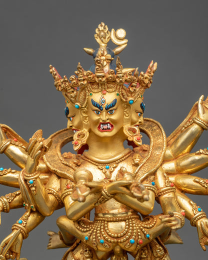 Chakrasamvara statue side view displaying vajra, bell, and consort