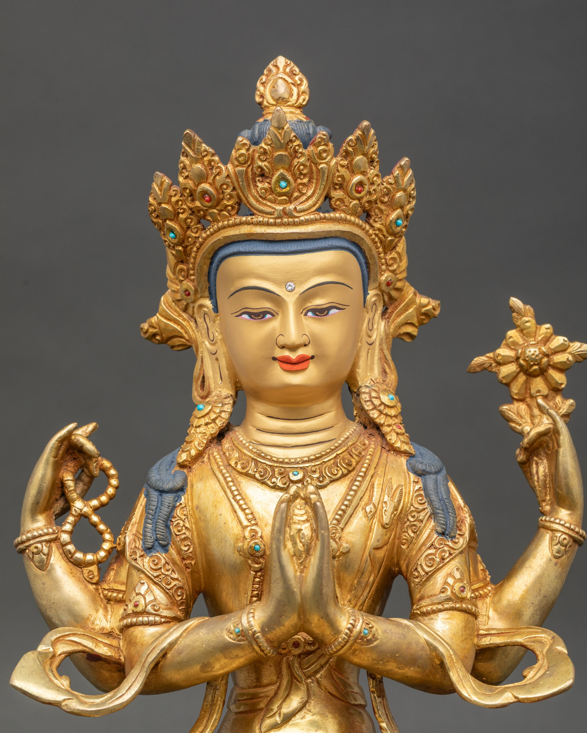 Chenrezig Avalokiteshvara statue close-up showing detailed Nepalese copper craftsmanship