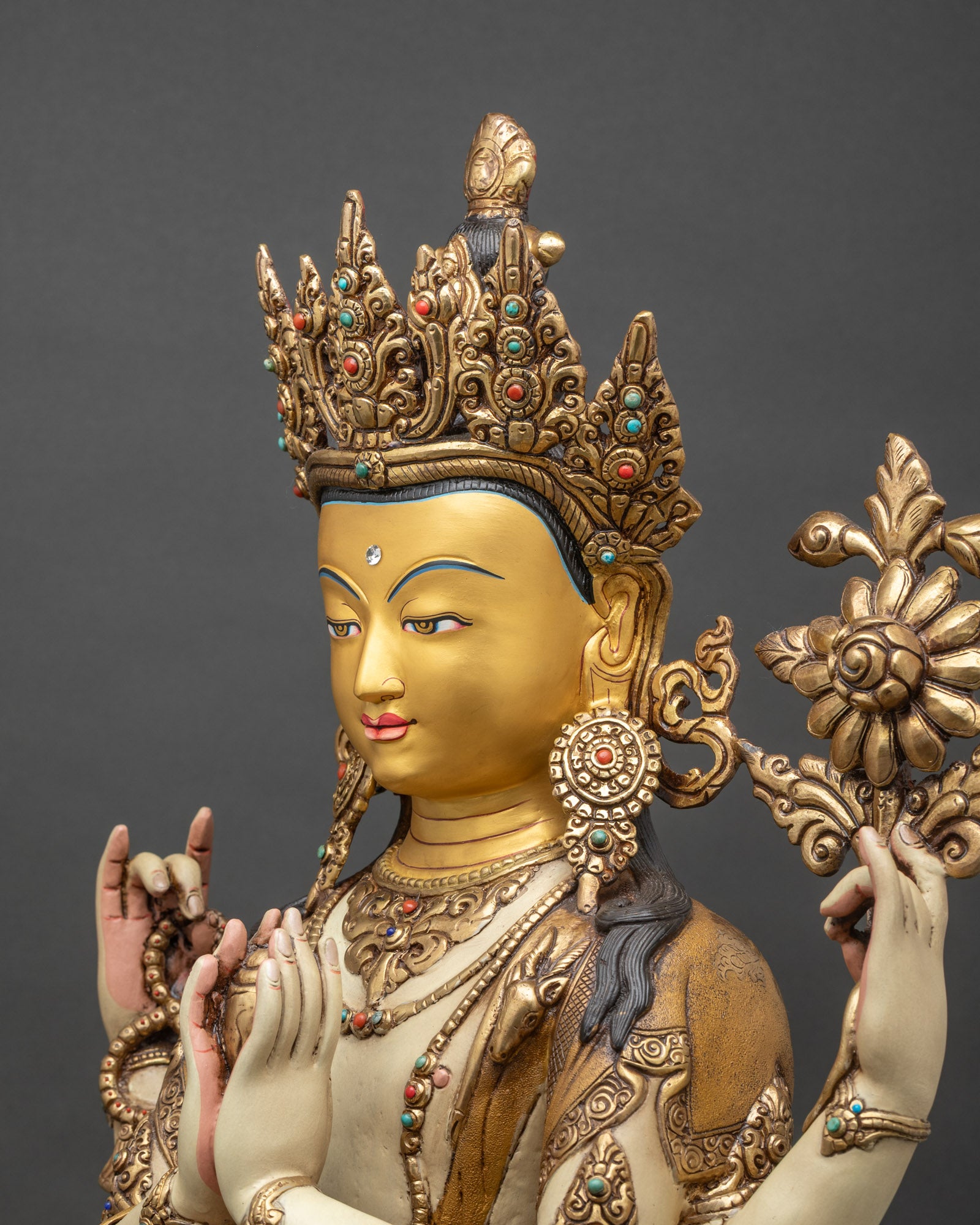 Chenrezig Statue detailed side close-up, lotus and crystal mala in copper and gold finish