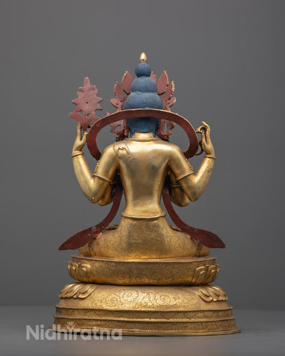 Back view of Chenrezig statue with ornate lower garment and mantra chamber base