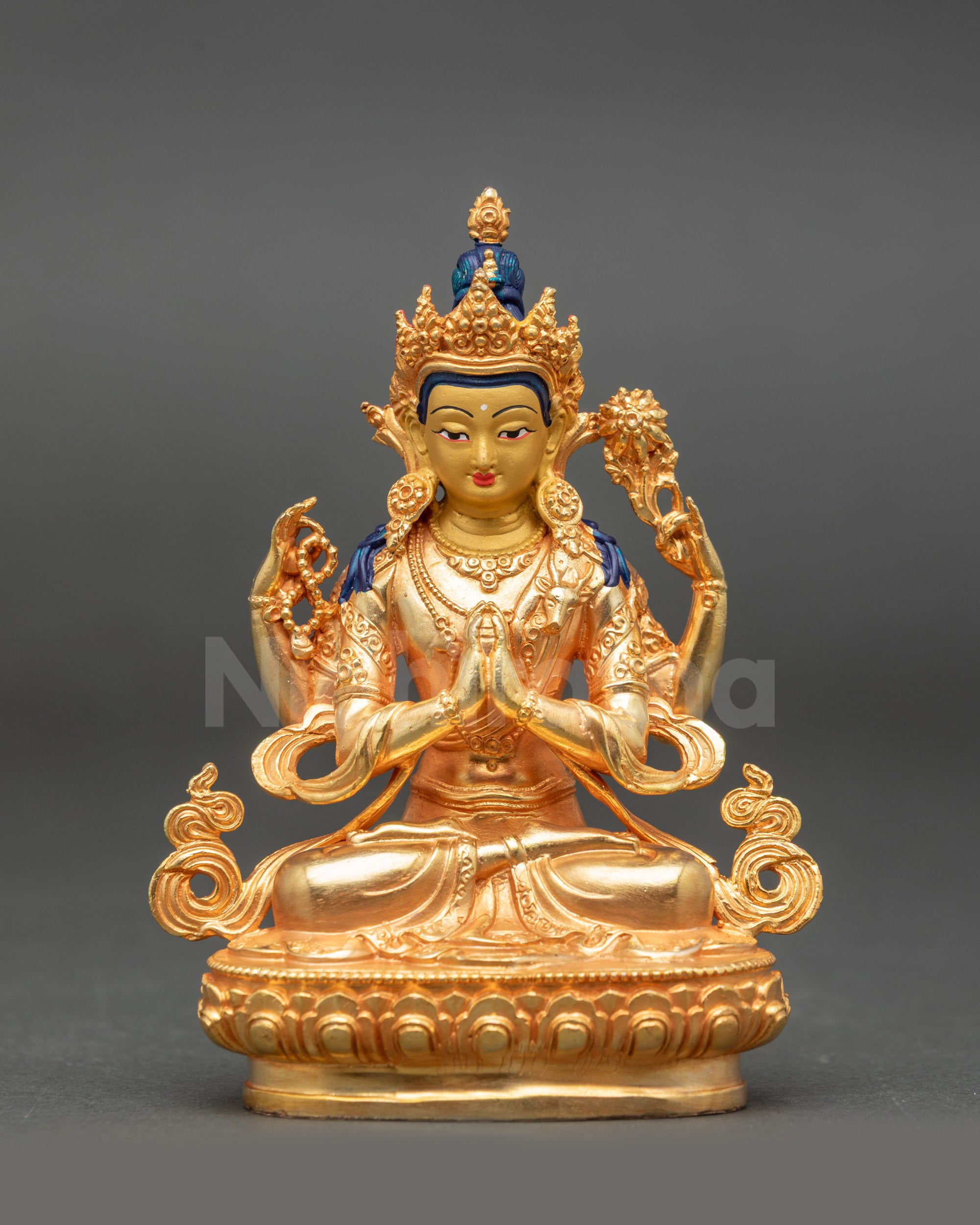 Chenrezig Statue front view gold fire-gilded face seated on lotus with four symbolic hands