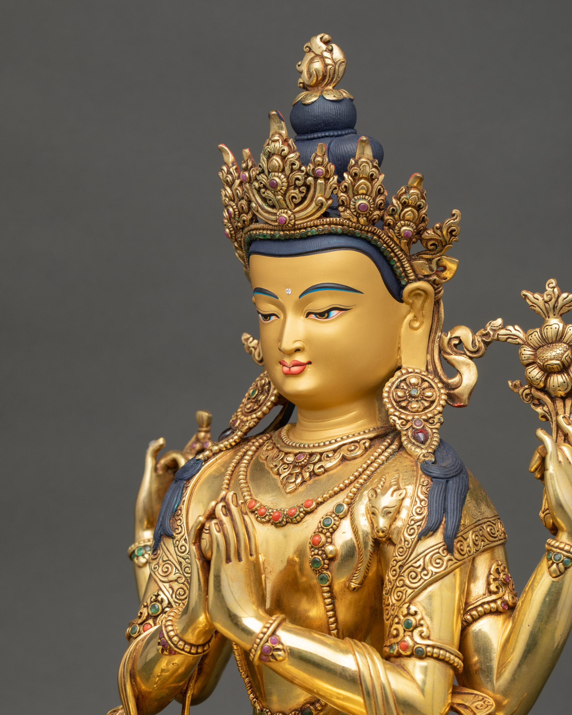 Chenrezig Statue side detail showing flowing robes and carved patterns