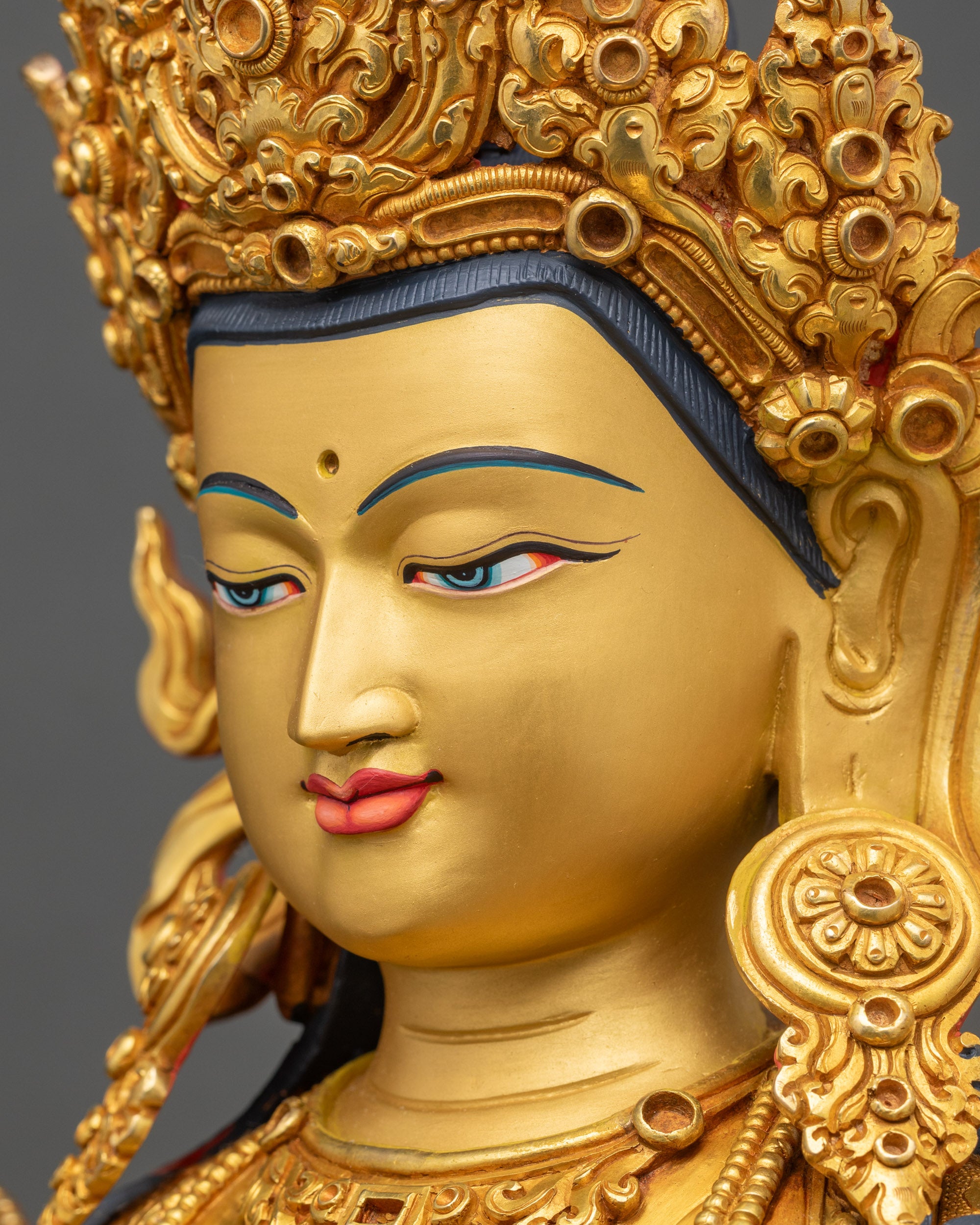 Chenrezig detailed side face close up with crown and jewelry