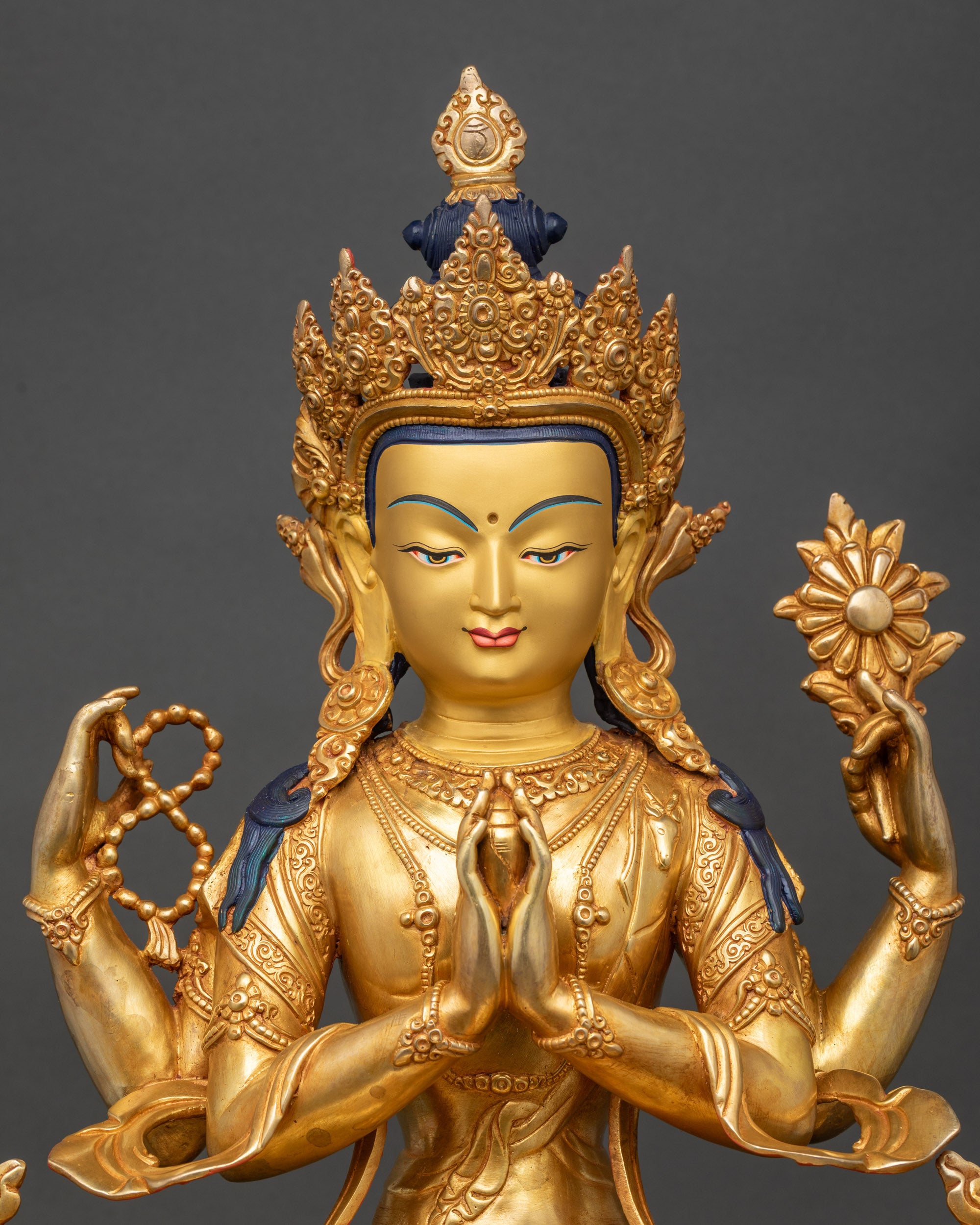 Chenrezig statue close-up showing Newari craftsmanship and gold gilded details