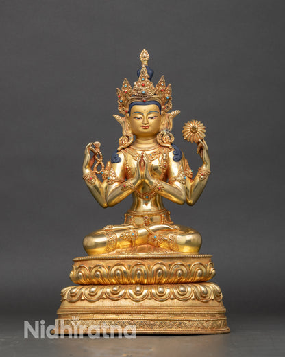 Chenrezig statue with four arms, crystal rosary, lotus flower on lotus pedestal
