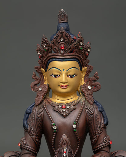Close Up Amitayus Buddha Statue with Semi Precious Stones and Serene Expression.