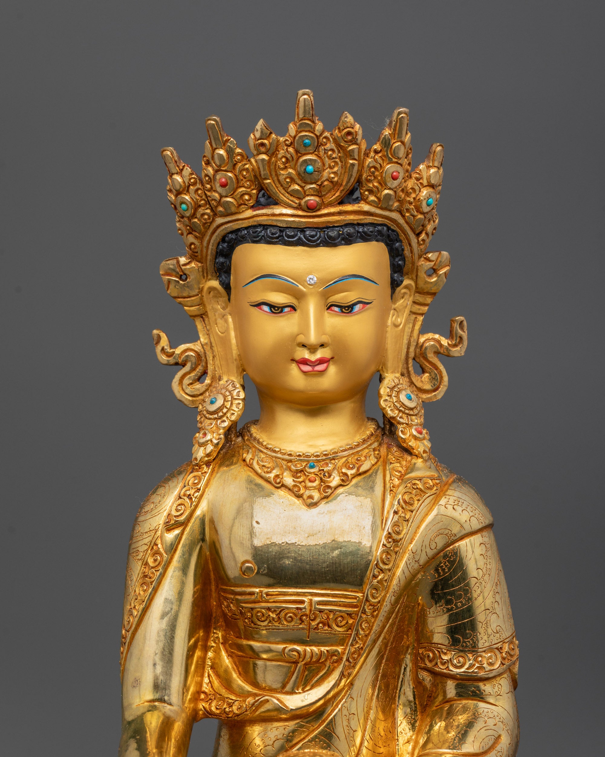 Close-Up of Buddha’s Crown and Face with 24k Gold Finish