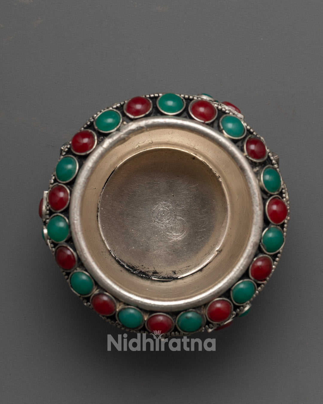 Close-Up of Intricate Silver Detailing on Traditional Buddhist Neshi Ricepot