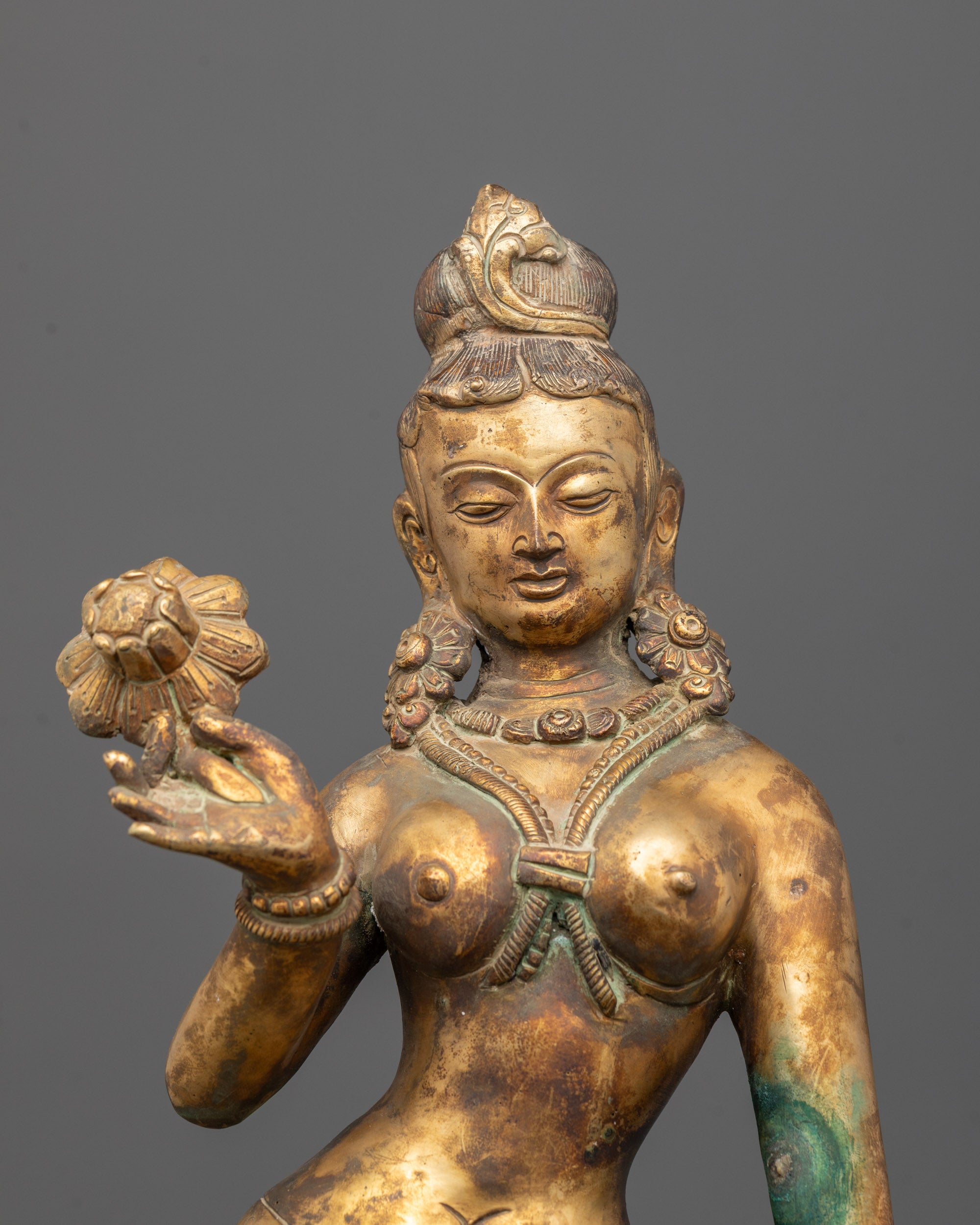 Close-Up of Mayadevi’s Face with Pure Gold Gilded Glow